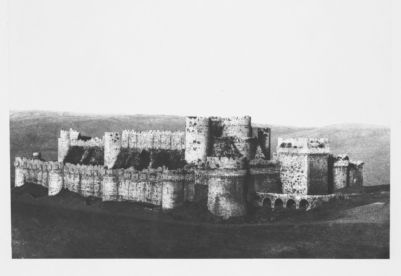 Distant view of the Krak of the Knights Castle from the southwest, Ottoman Empire (now in Syria)