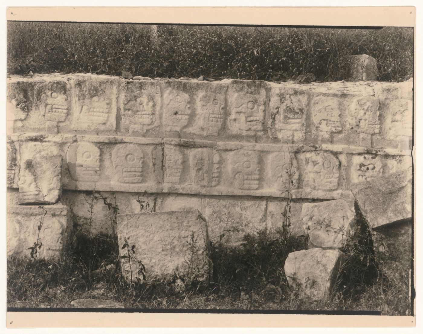 Close-up view of a parapet in the Tzompantli [skull rack] showing relief carvings of skulls, Chichén Itzá Site, Yucatán, Mexico