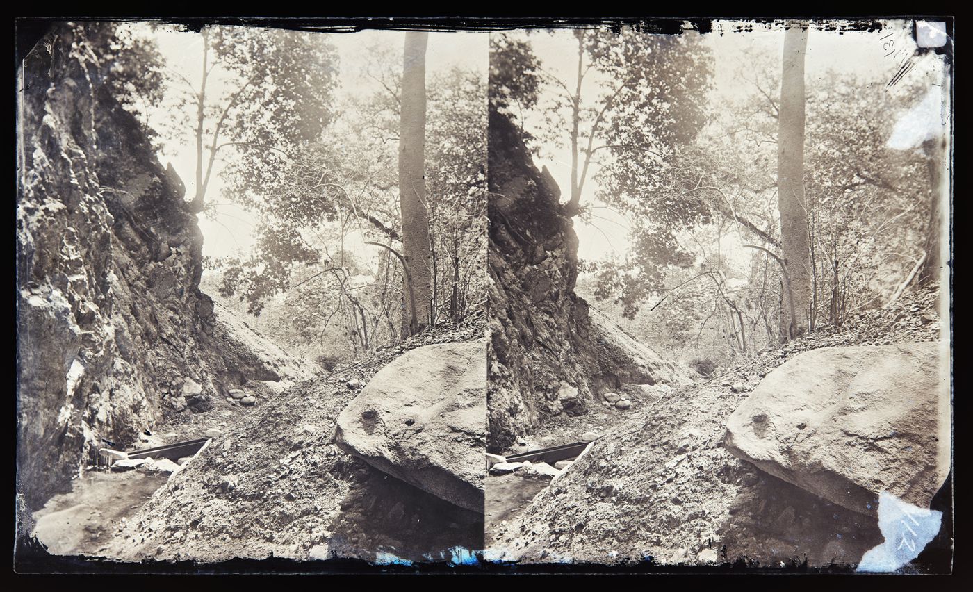 Stereograph of a rocky forested area, California, United States of America