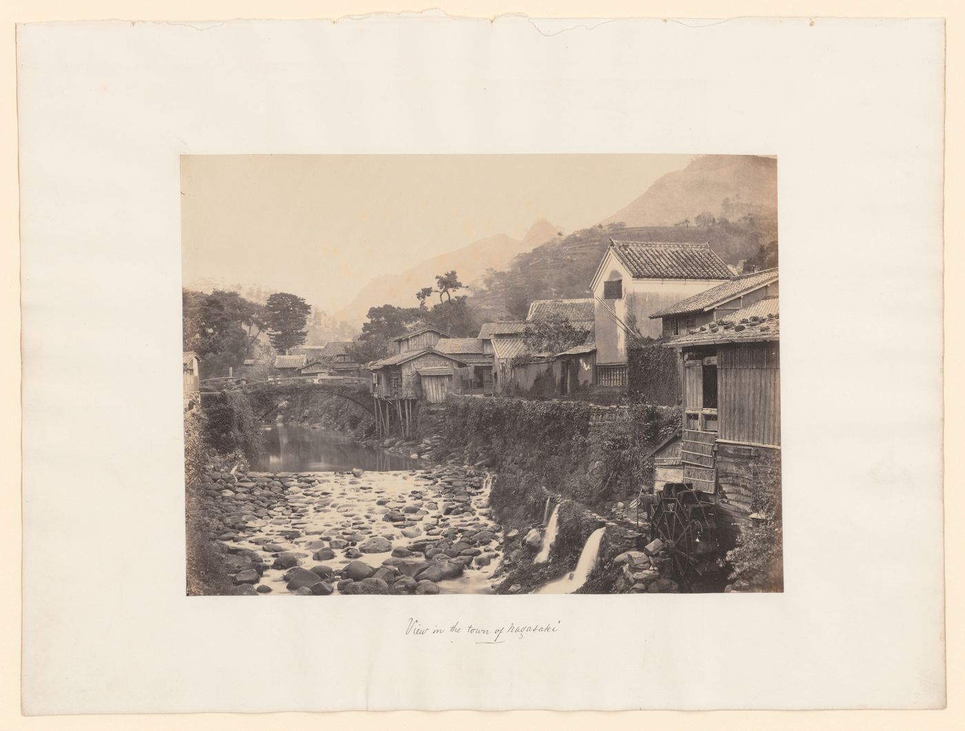 View of houses, a bridge and the Nakashima River, Nagasaki, Japan