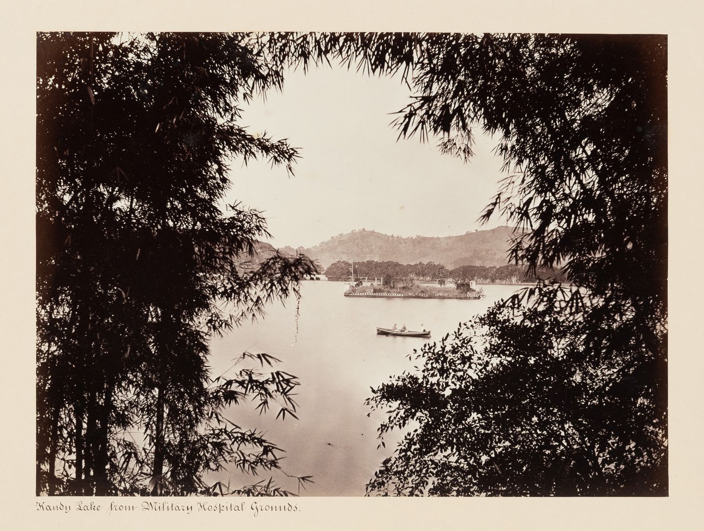 View of Kandy Lake from the ground of the Military Hospital, Kandy, Ceylon (now Sri Lanka)