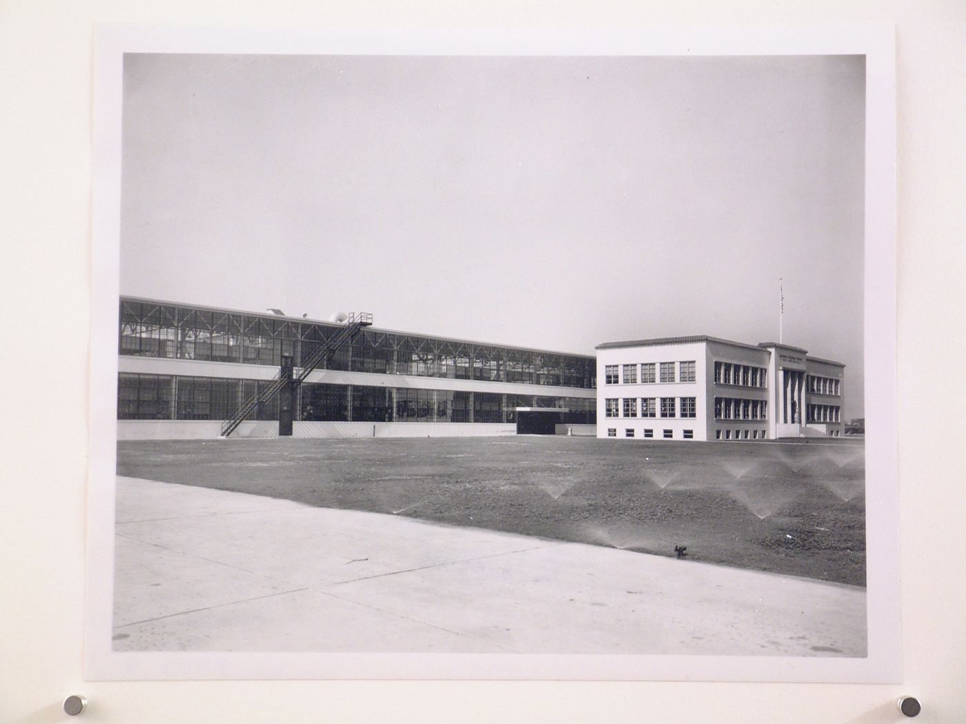 View of the principal and lateral façades of the Administration Building and Manufacturing Building, General Motors Corporation Southern California division Automobile Assembly Plant, Los Angeles, California