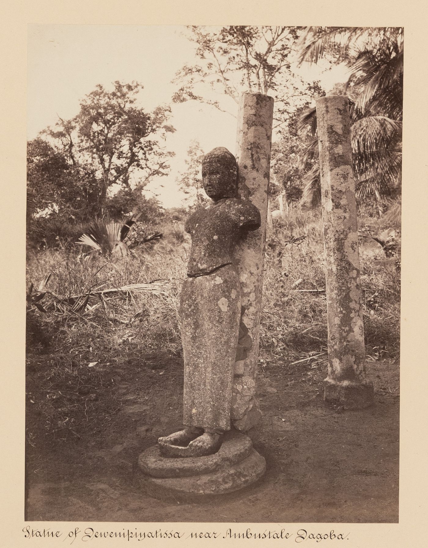 View of a statue of King Devanampiyatissa, near the Ambustala Chetiya (also known as the Ambastala Watadage and the Ambastala Dagoba), Mihintale, Ceylon (now Sri Lanka)