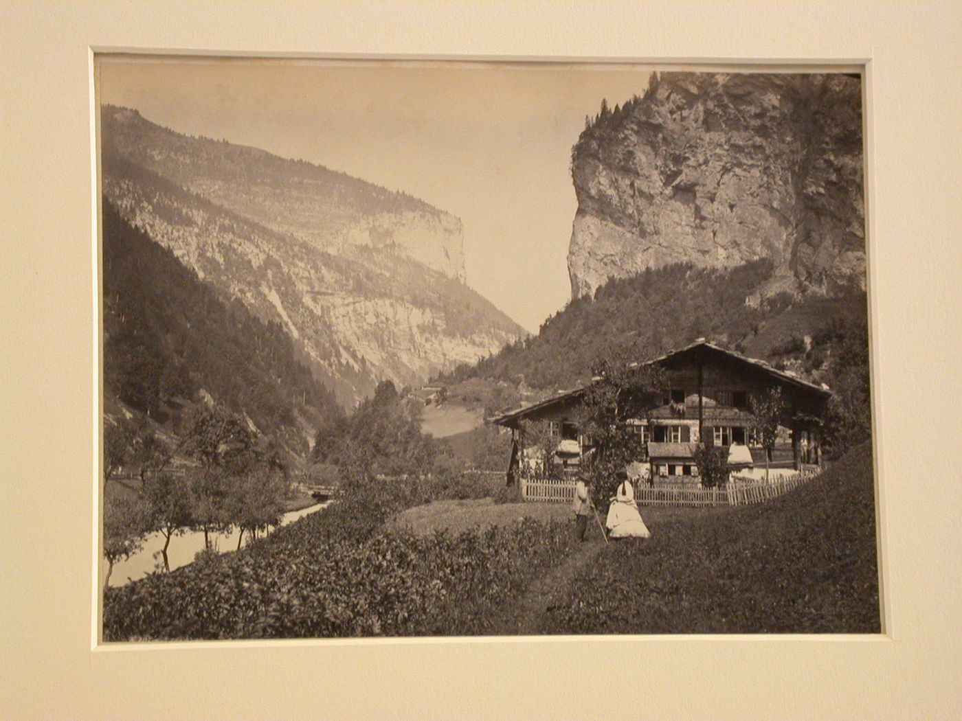 View of a chalet, 2 figures in foreground, Vallée de Lauterbrunnen?, Switzerland ?