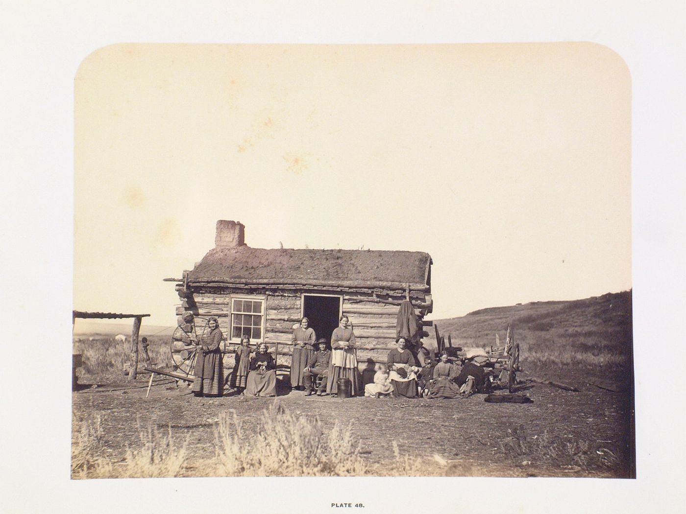 House in Great Salt Lake Valley, with family in front, Utah