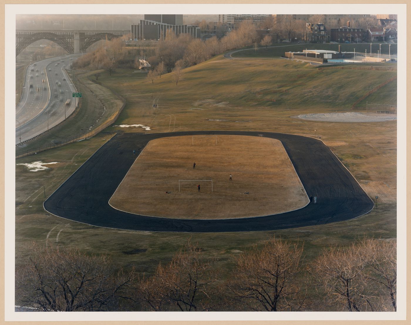 Don Valley: view of playing field of Riverdale Park next to Don Valley Parkway, Toronto, Ontario