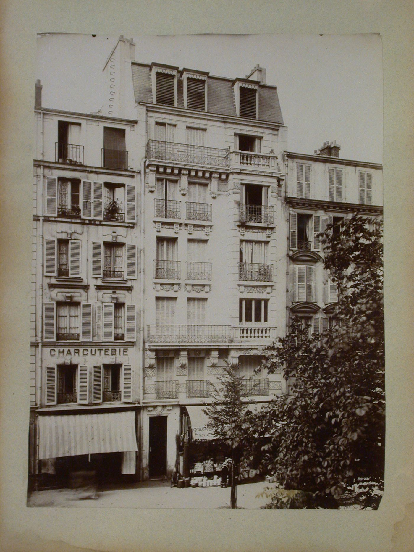 View of stores and apartment houses, Paris, France