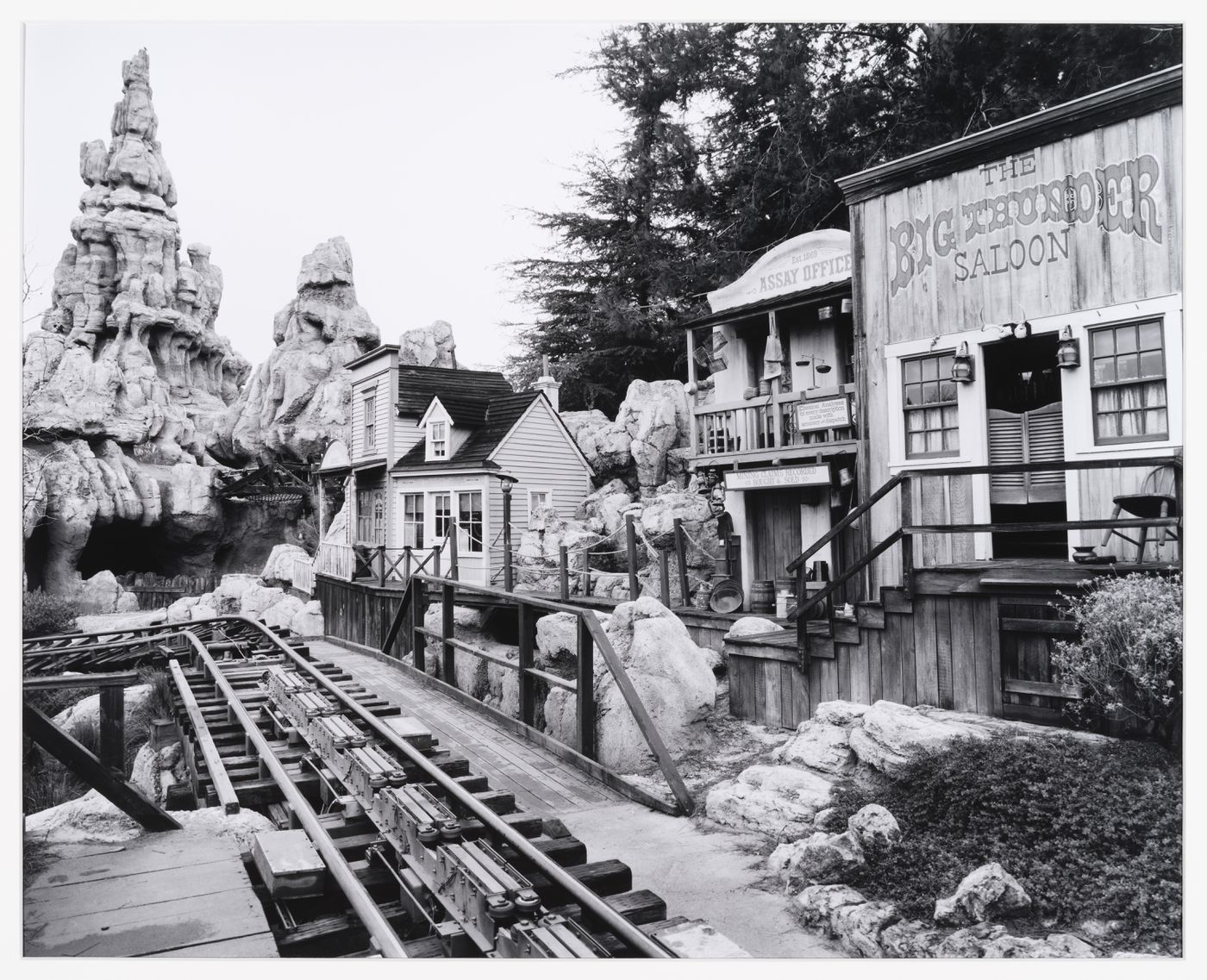 View of Westernland showing saloon, railroad and Big Thunder Mountain in the background, Disneyland, Tokyo, Japan