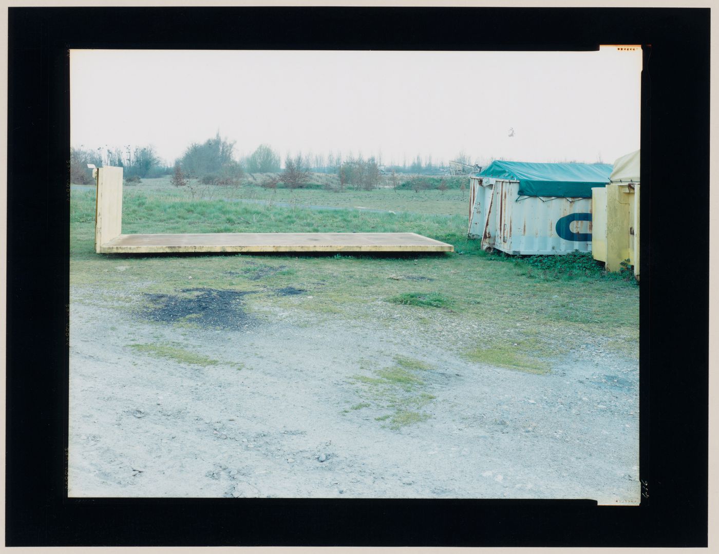 View of truck trailers and a tract, Rambouillet, France (from the series "In between cities")