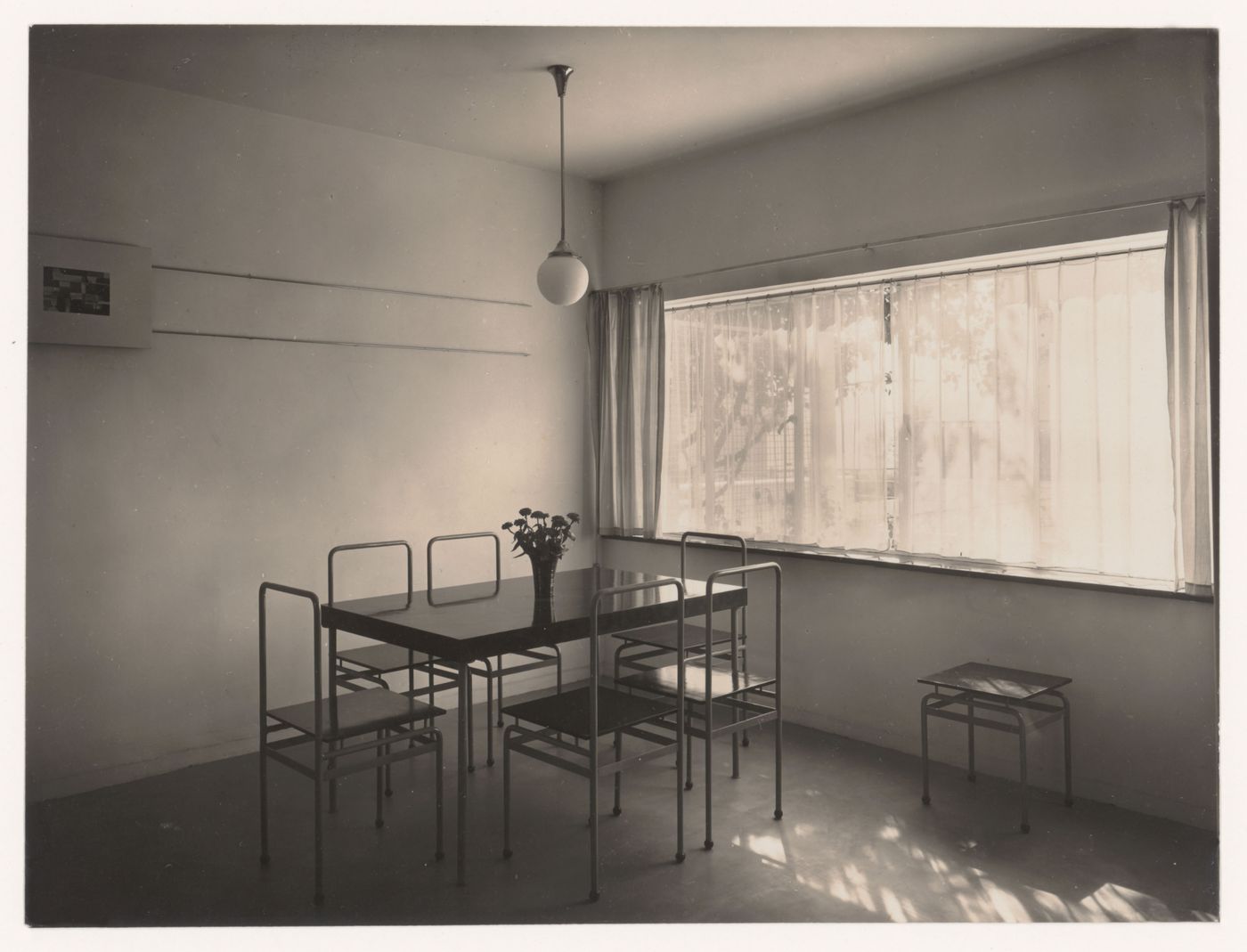 Interior view of the dining room of House 7 showing a table and chairs, Weissenhofsiedlung, Stuttgart, Germany