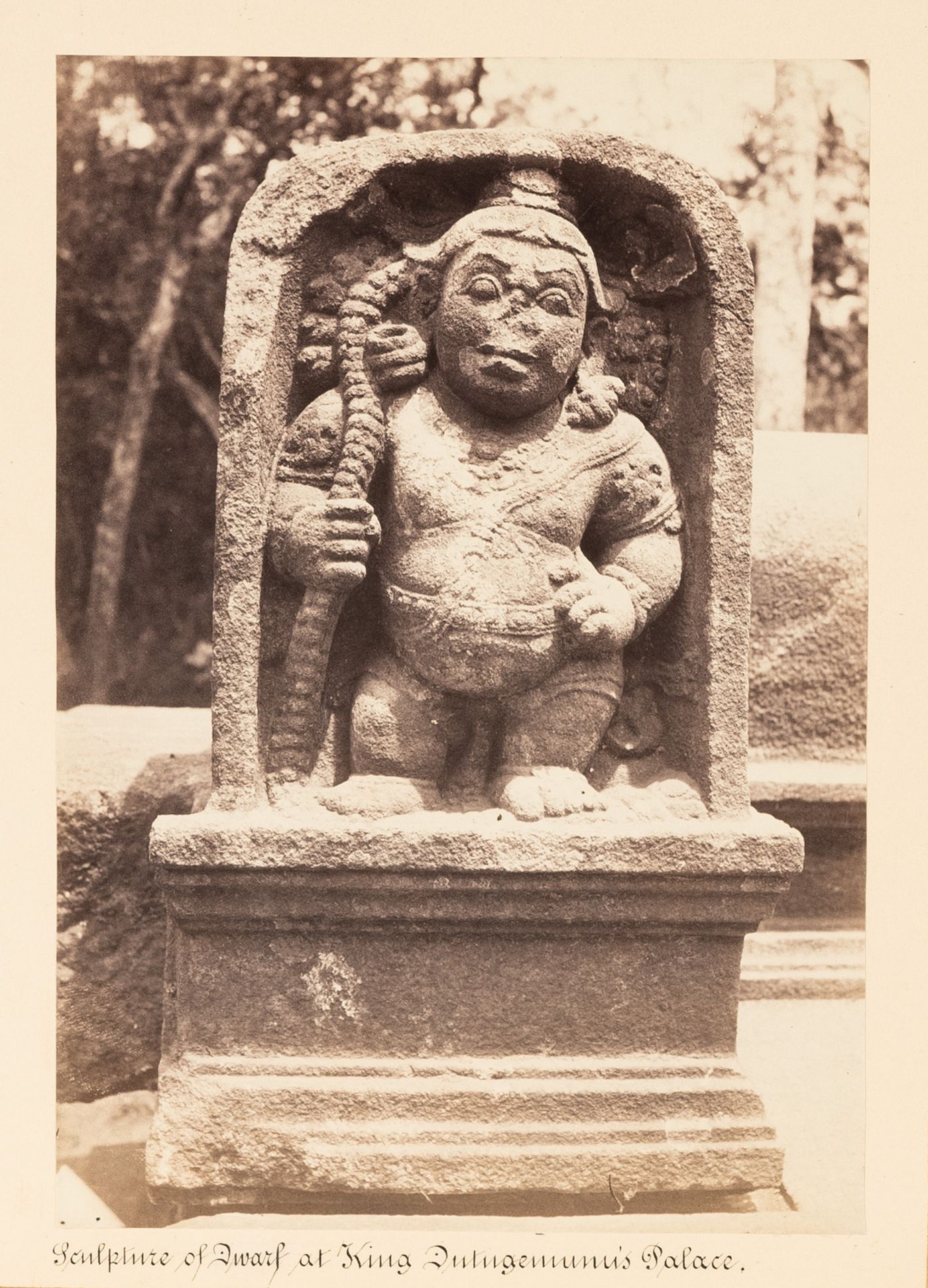 Close-up view of a stele showing a relief of a dwarf, King Mahasen's Palace, Anuradhapura, Ceylon (now Sri Lanka)