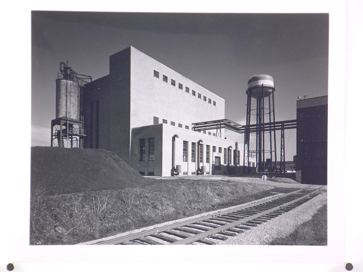 View of the south façade of the Boiler House showing the water tower, General Motors Corporation New Departure division Automobile [?] Assembly Plant, Sandusky, Ohio