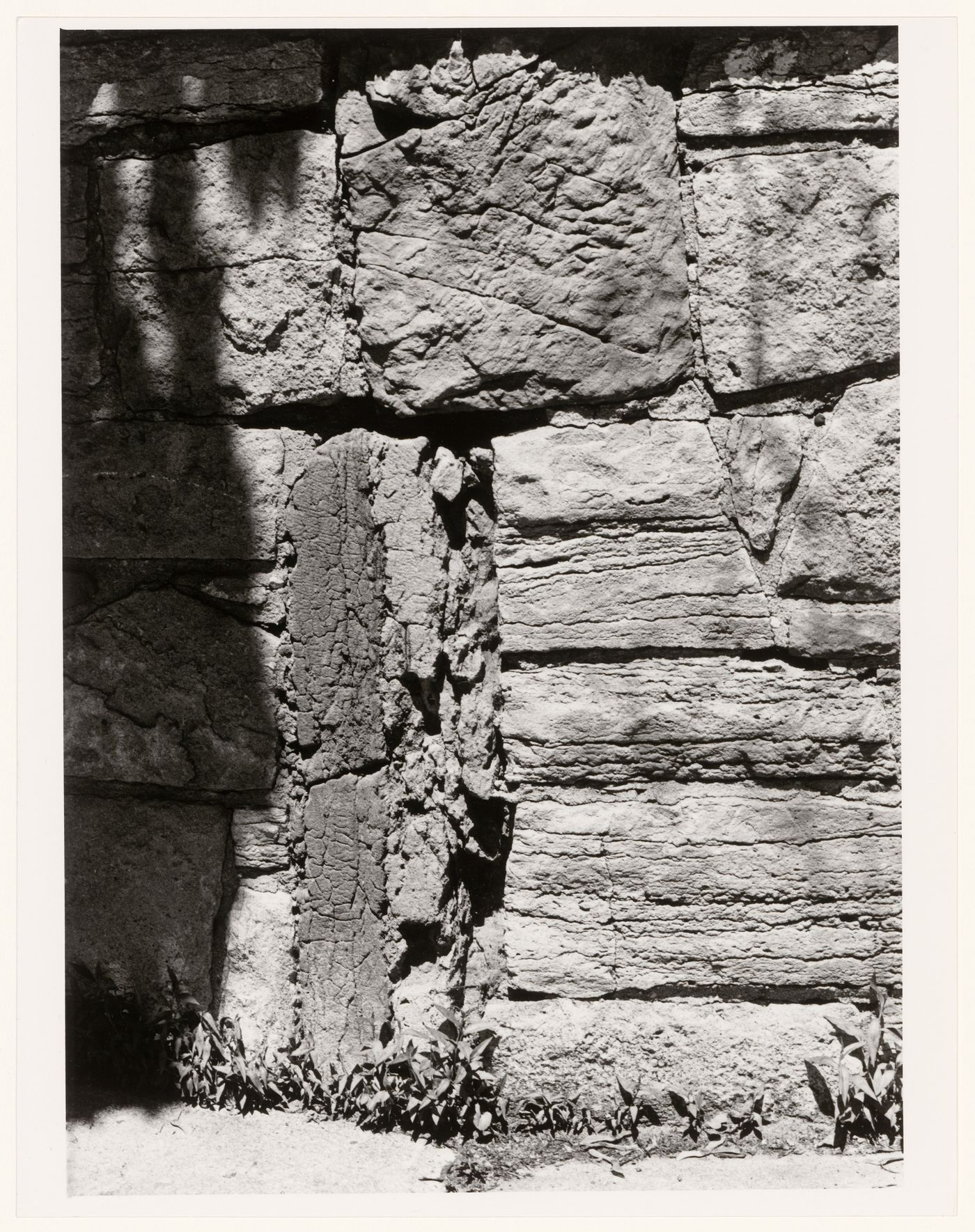 Close-up view of a stone wall showing the milestone which indicates the distance from the Sulpician Fort, corner of chemin de la Côte-Saint-Antoine and Forden Avenue, Westmount, Québec