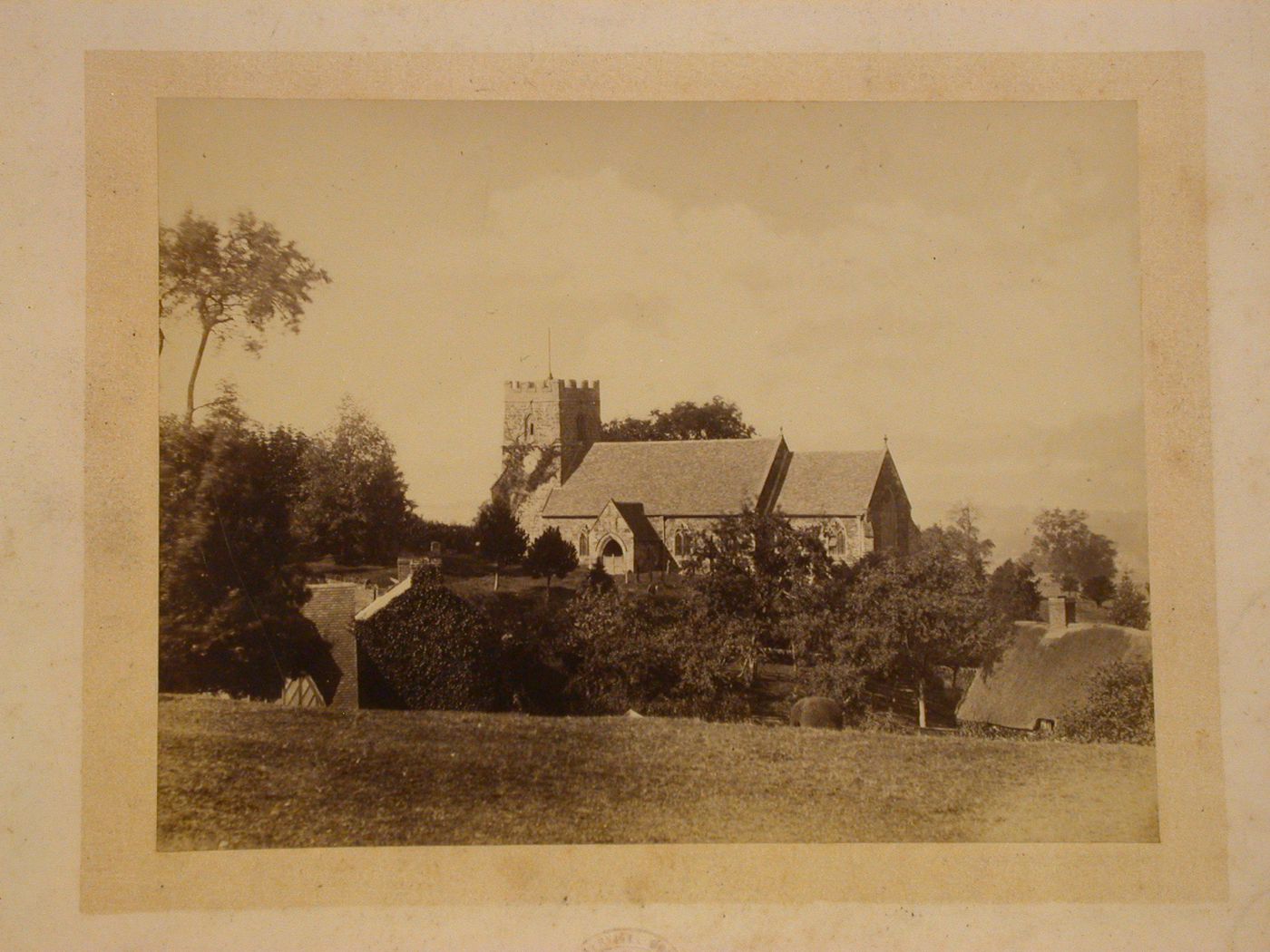 Distant view of the Church of St. John the Baptist, Hellidon, Daventry, Northamptonshire, England