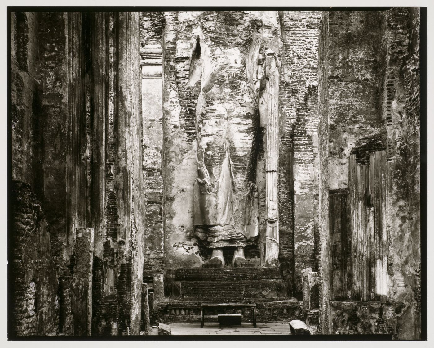 Partial view of a statue of Buddha showing the torso and legs, Lankatilaka image-house (also known as the Jetavanarama), Alahana Parivena, Polonnaruwa, Sri Lanka