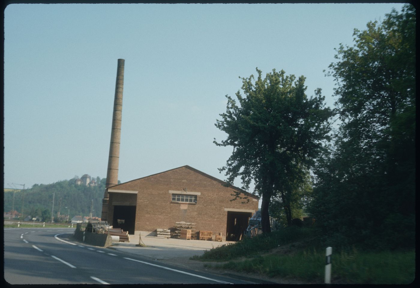 Industrial building and smokestack, Germany