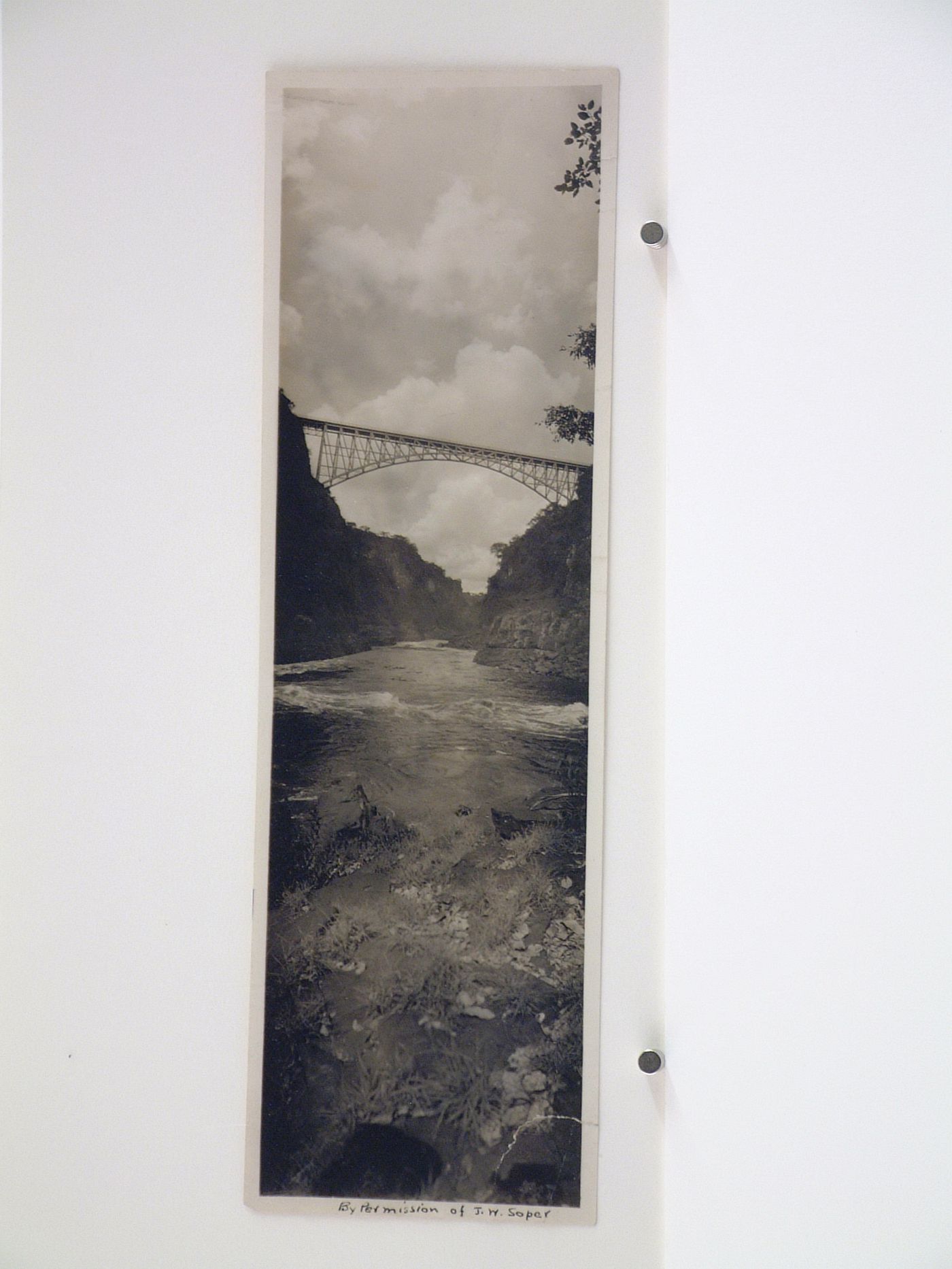 Vertical panoramic view of Victoria Falls Bridge and Zambezi River from below, crossing the border between Victoria Falls, Zimbabwe and Livingstone, Zambia