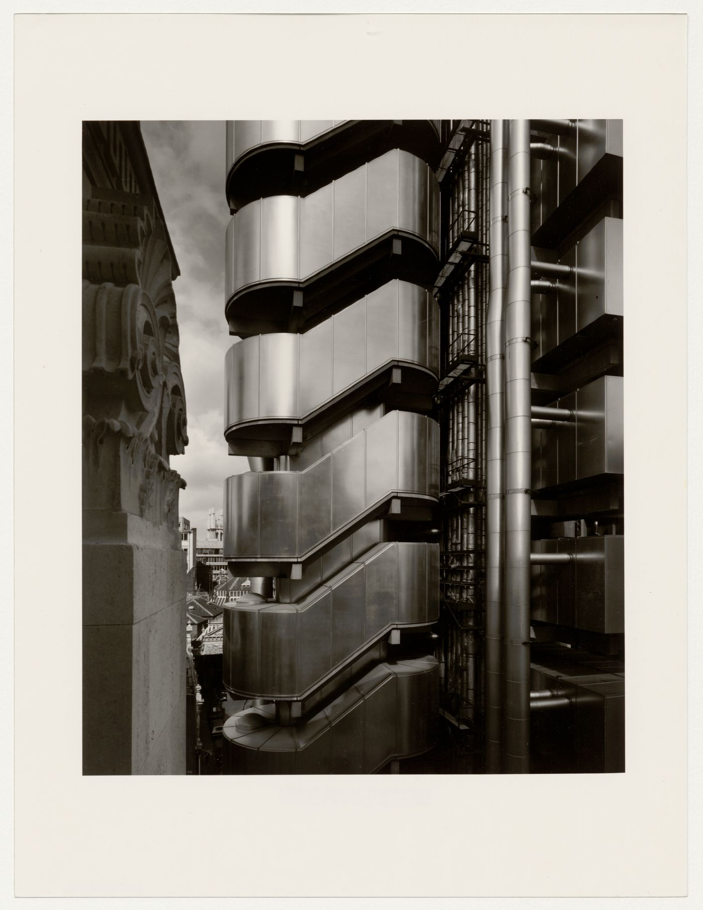 Partial view of a stairwell [?], pipes and conduits of Lloyd's Building, London, England