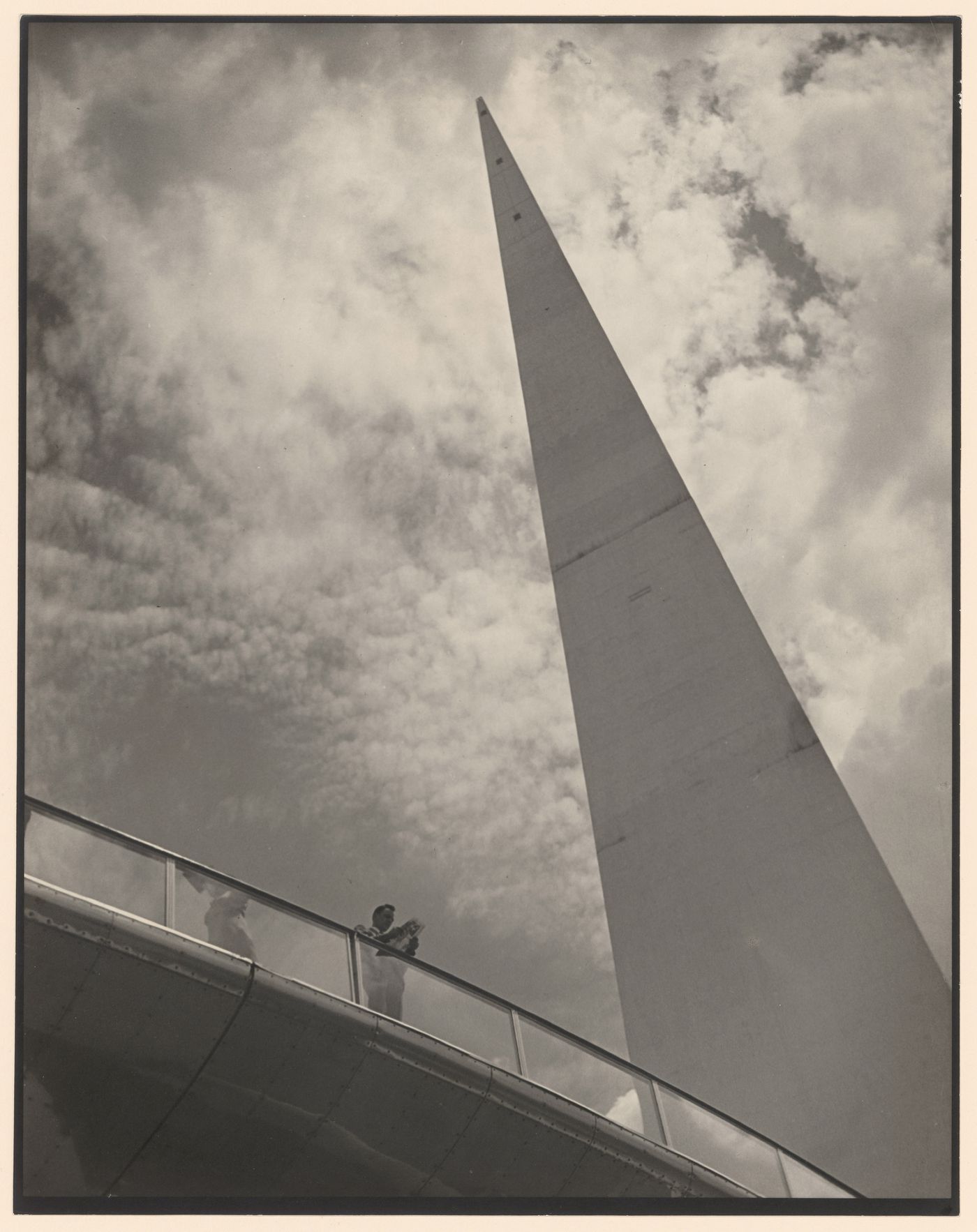 New York World's Fair (1939-1940): People standing on Perisphere ramp, partial view of Trylon on the right