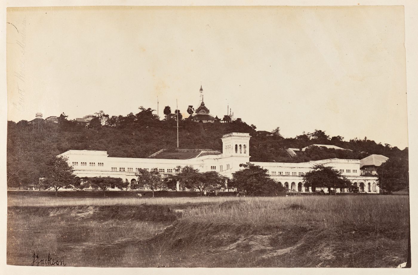 View of the Court House with a stupa and buildings in the background, Moulmein, Burma (now Myanmar)