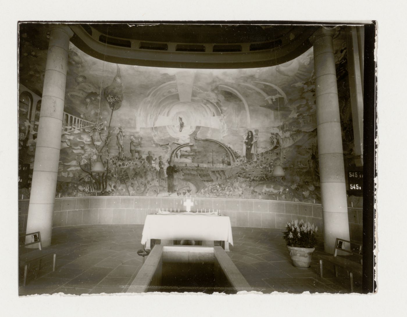 Interior view of the Chapel of the Holy Cross showing the altar and the fresco designed by Sven Erixson, Woodland Crematorium and Cemetery, Stockholm
