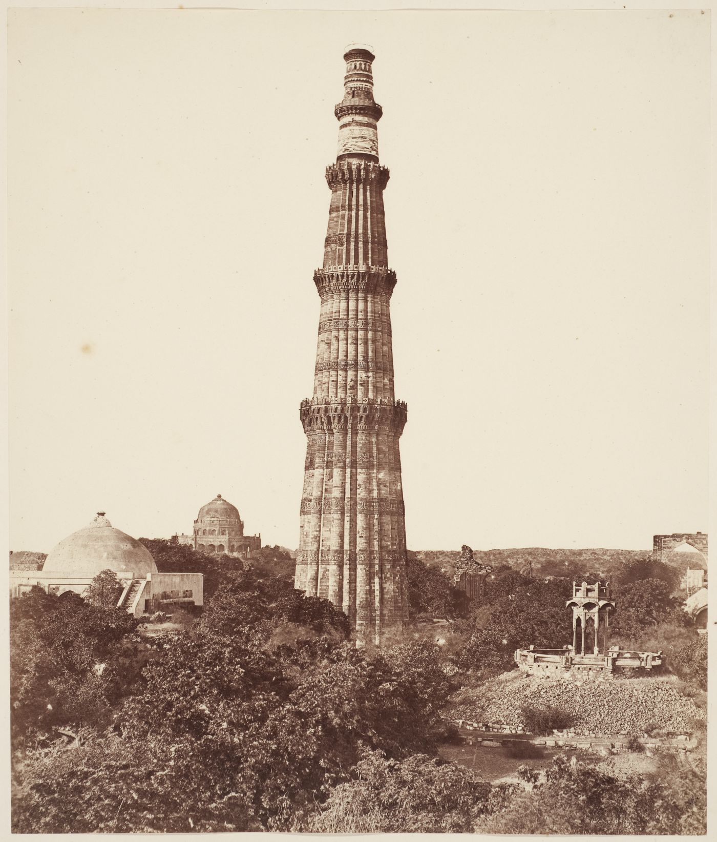View of the Qutb Minar showing the tombs of Ala-ud-Din and Iltutmish on the left, Delhi, India
