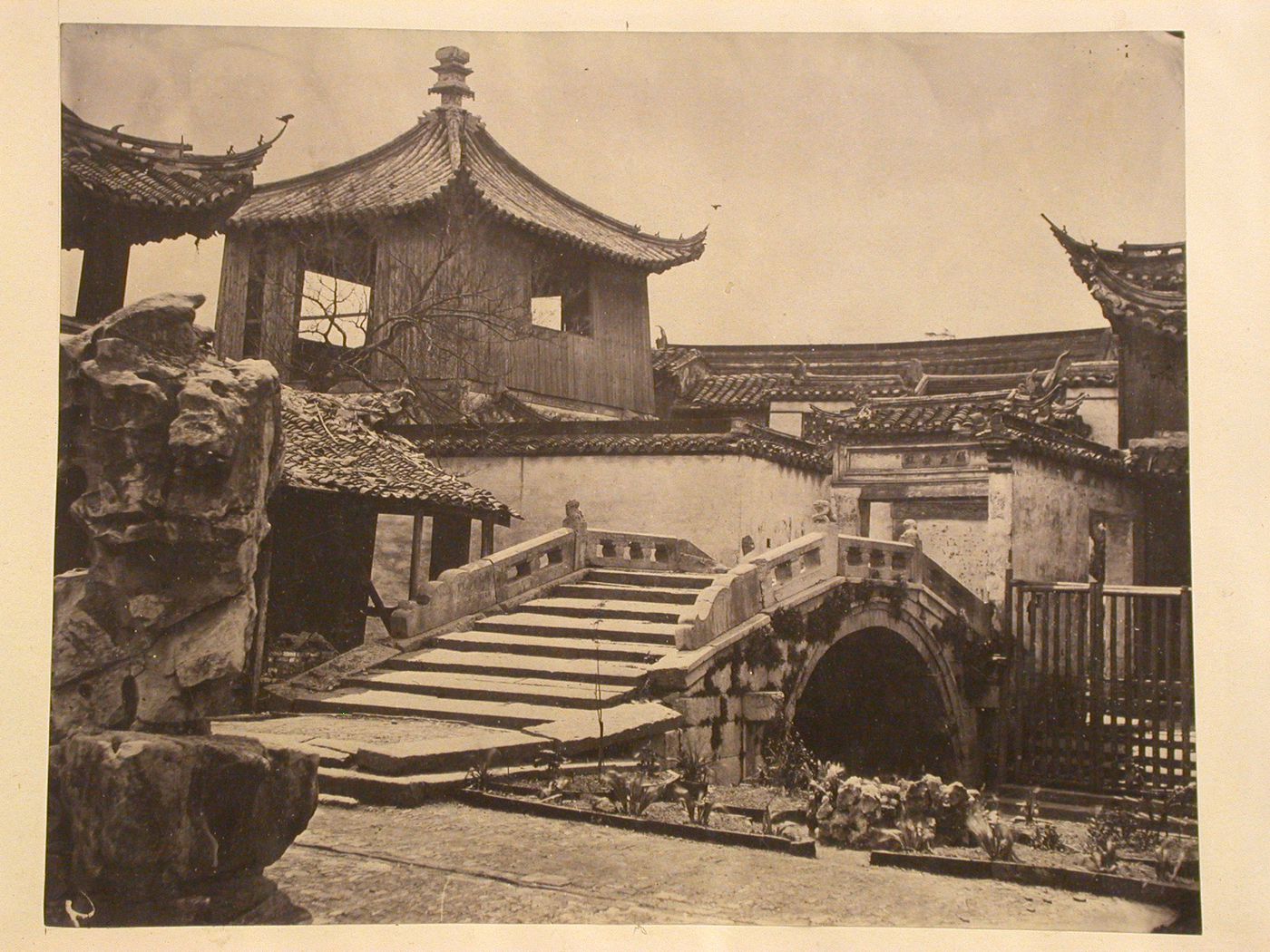 View of a bridge and buildings in Yu Yuan [The Garden to Please], Shanghai, China