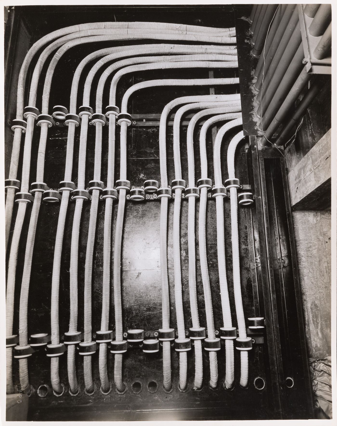 Interior view of electric conduits, possibly in the main pavilion of Université de Montréal, Montréal [?], Québec