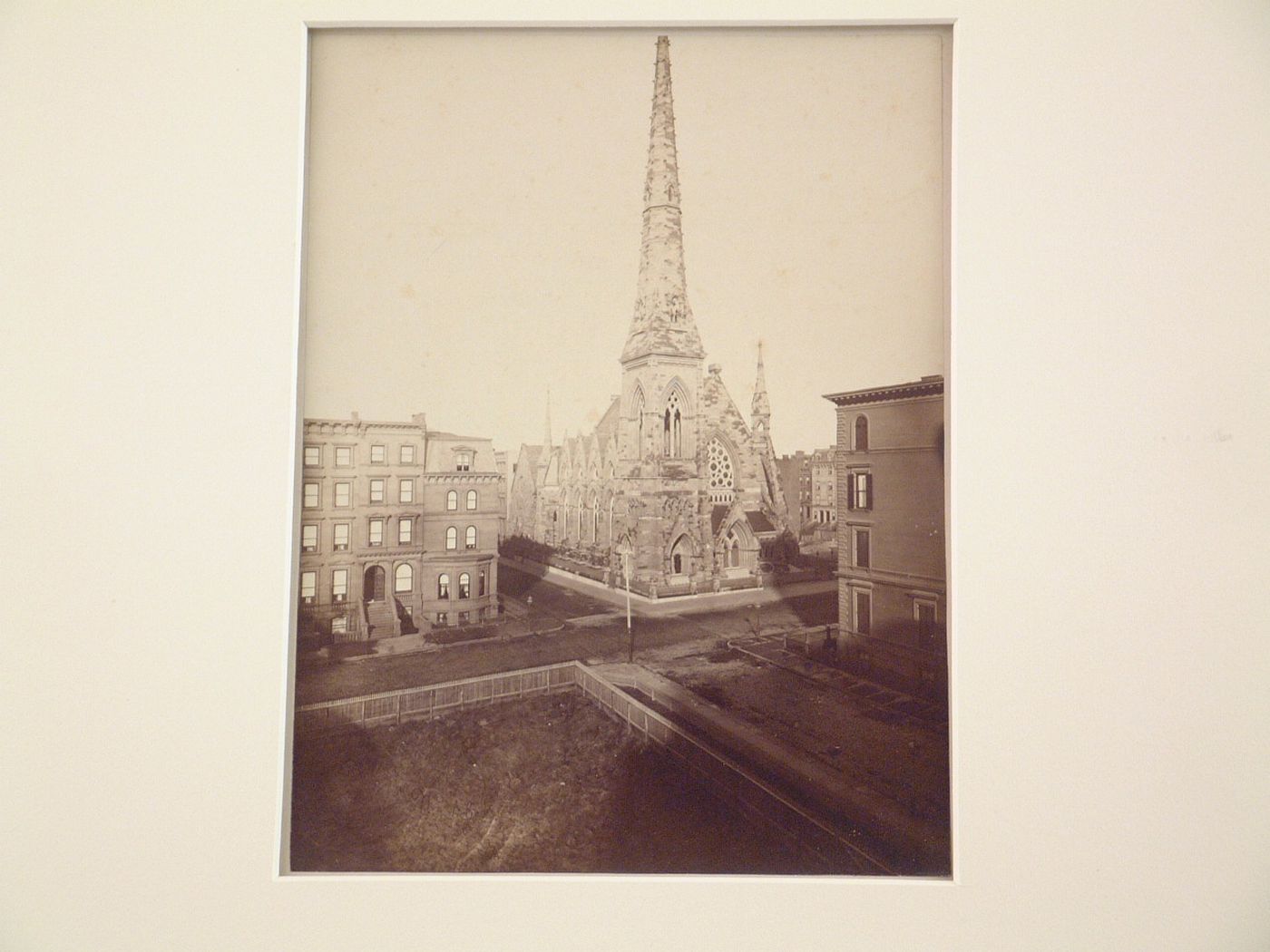 View of street intersection with church on one corner, New York City, New York