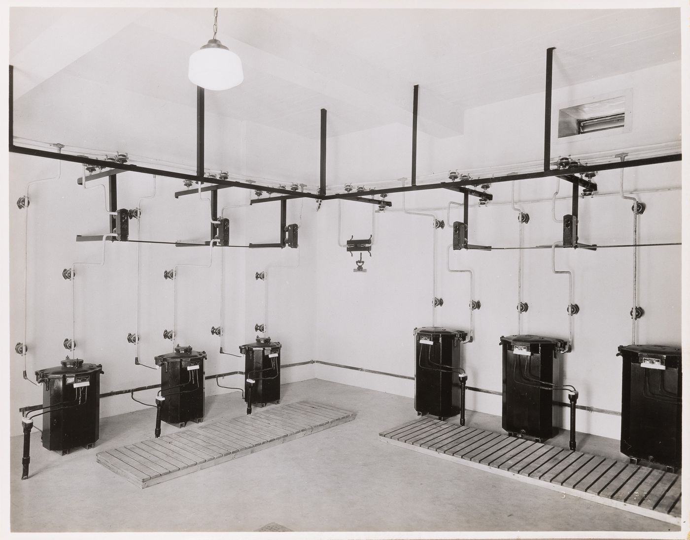 Interior view of the electrical system including step-down transformers [?] and electric conduits, Institut Nazareth (now the Centre Hospitalier Côte-des-Neiges), 4565 chemin Queen-Mary, Montréal, Québec