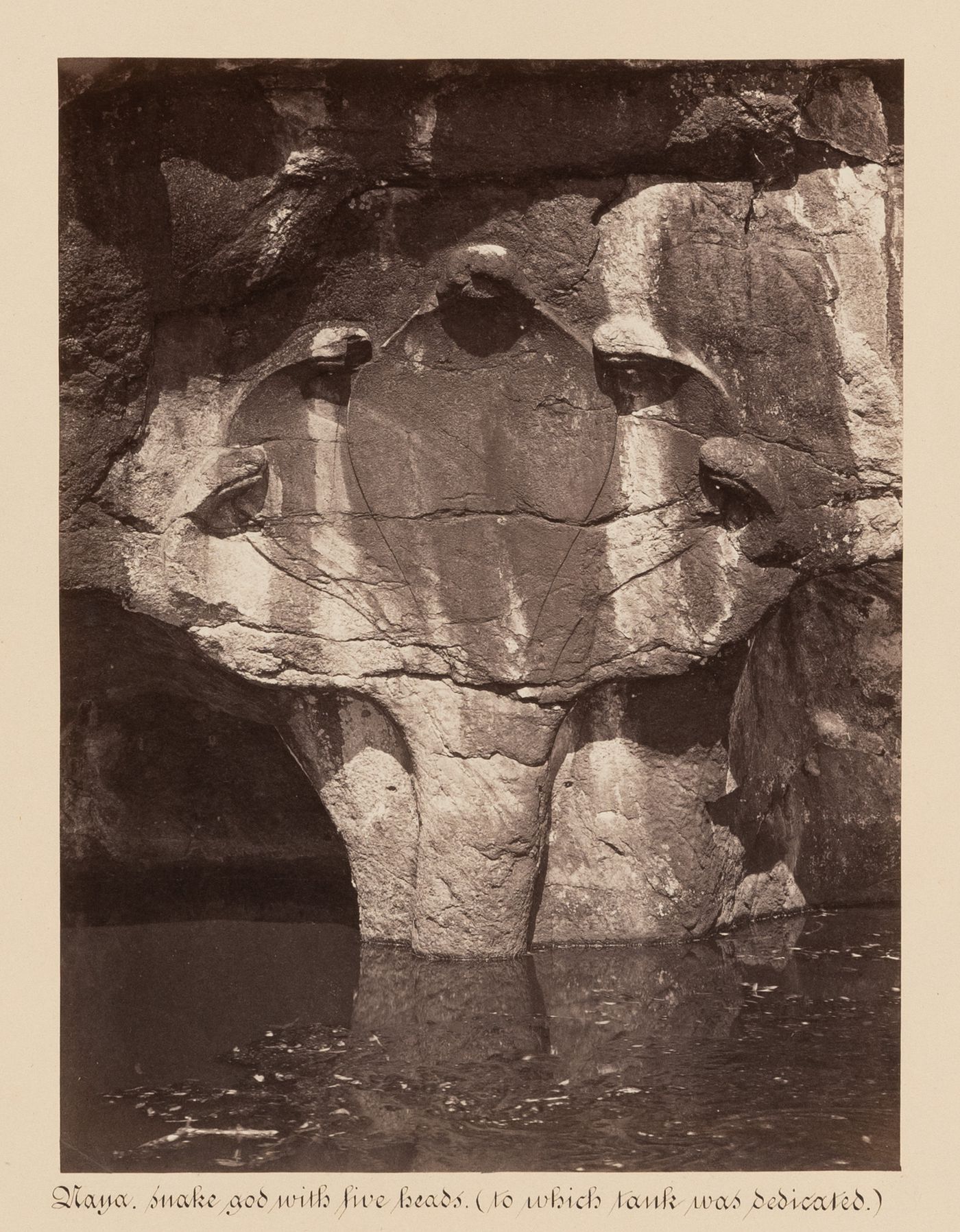 View of a relief of Naga, the five headed cobra, Naga Pokuna (also known as the snake bathing pool and the Cobra Pond), Mihintale, Ceylon (now Sri Lanka)