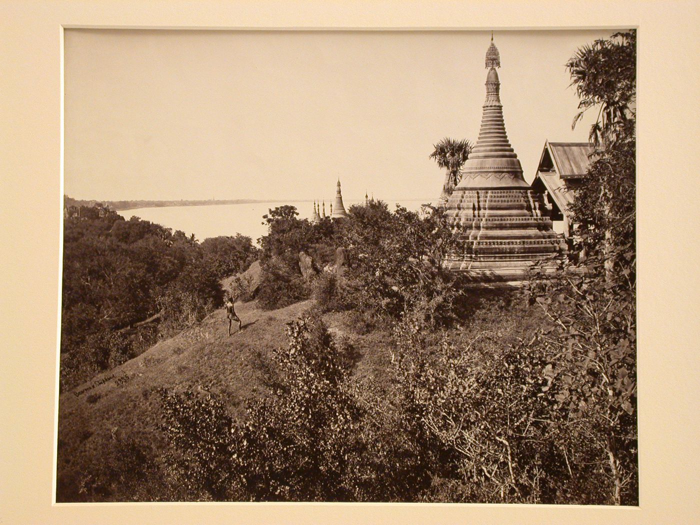 View of Mya Thalun [?] Pagoda on the banks of the Irrawaddy River, Magwe, Burma (now Myanmar)