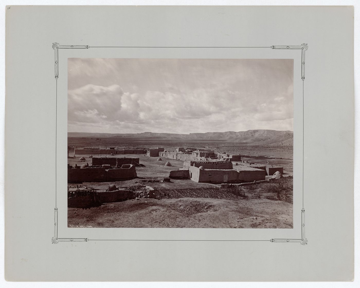 View of Kha'p'oo Owinge (Santa Clara Pueblo) with land cultivation in the foreground, New Mexico, United States