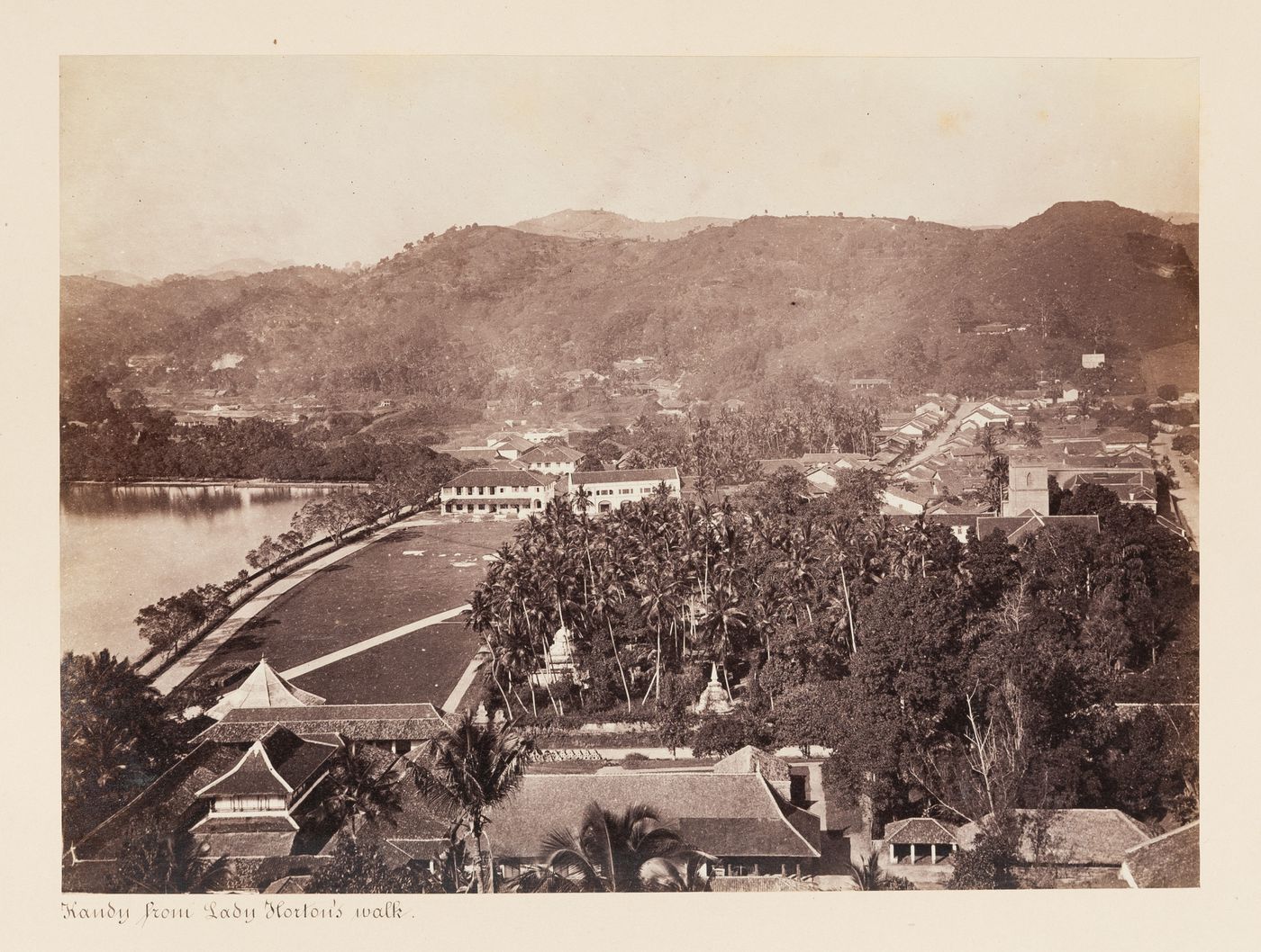 View of Kandy from Lady Horton's Walk with Kandy Lake on the left, St. Paul's Church on the right and the Temple of the Tooth (also known as the Sri Dalada Maligawa) in the foreground, Ceylon (now Sri Lanka)