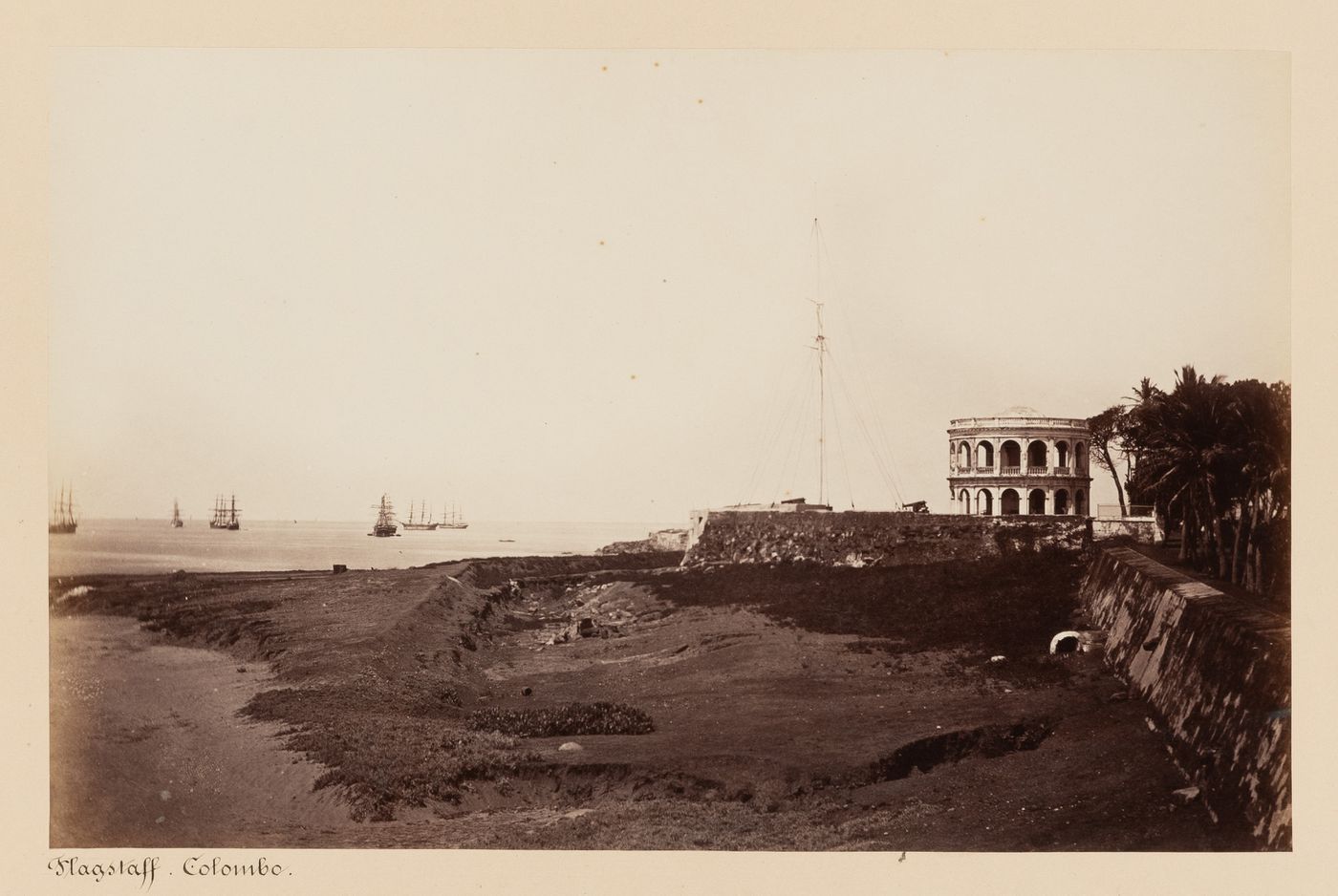 View of the Galle Buck, the Old Lighthouse and the Colombo Flagstaff with ships in the background, Colombo, Ceylon (now Sri Lanka)