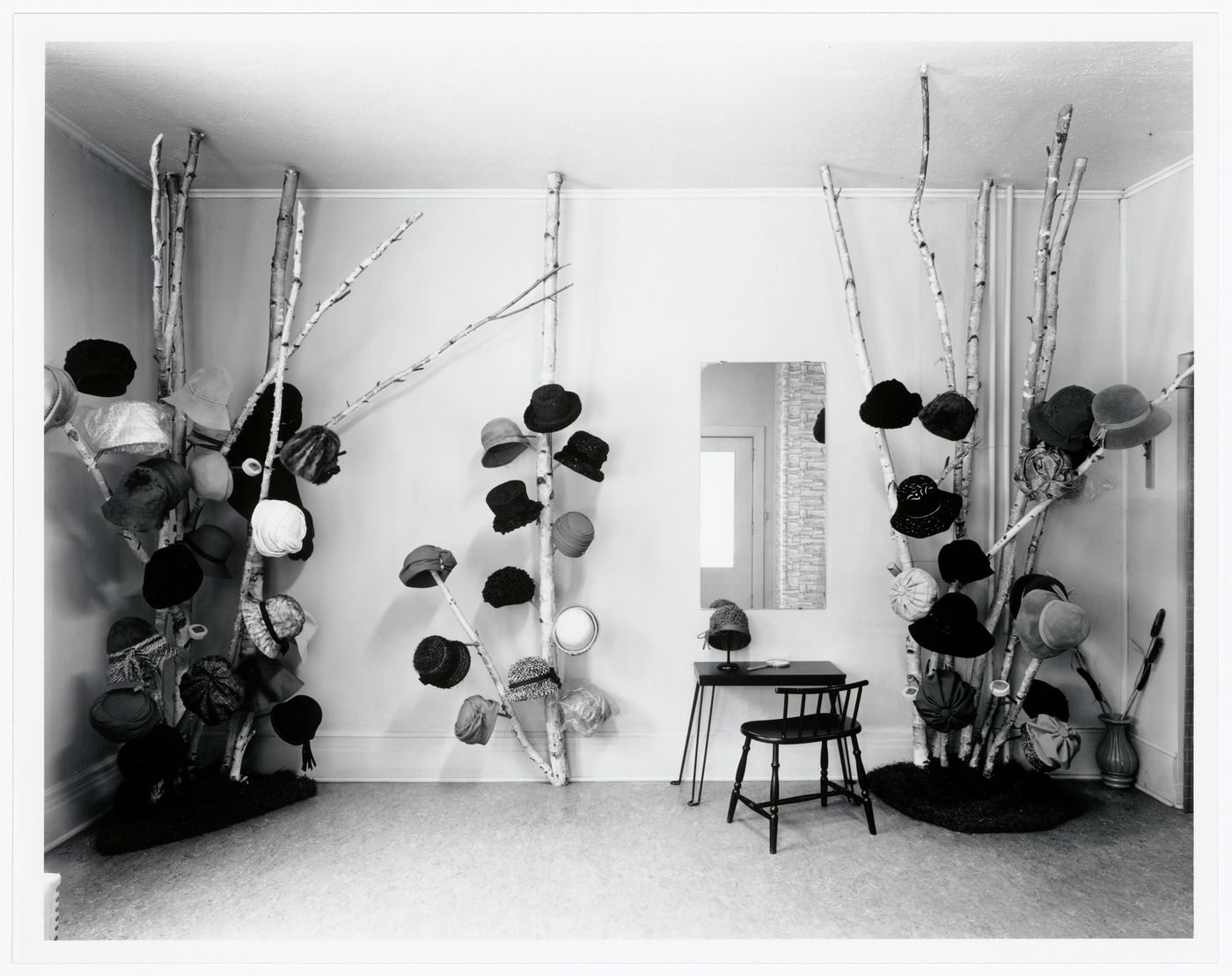 Hat Trees in a Hat Store (printed on mat): hats hung on branches, tree-trunks, interior