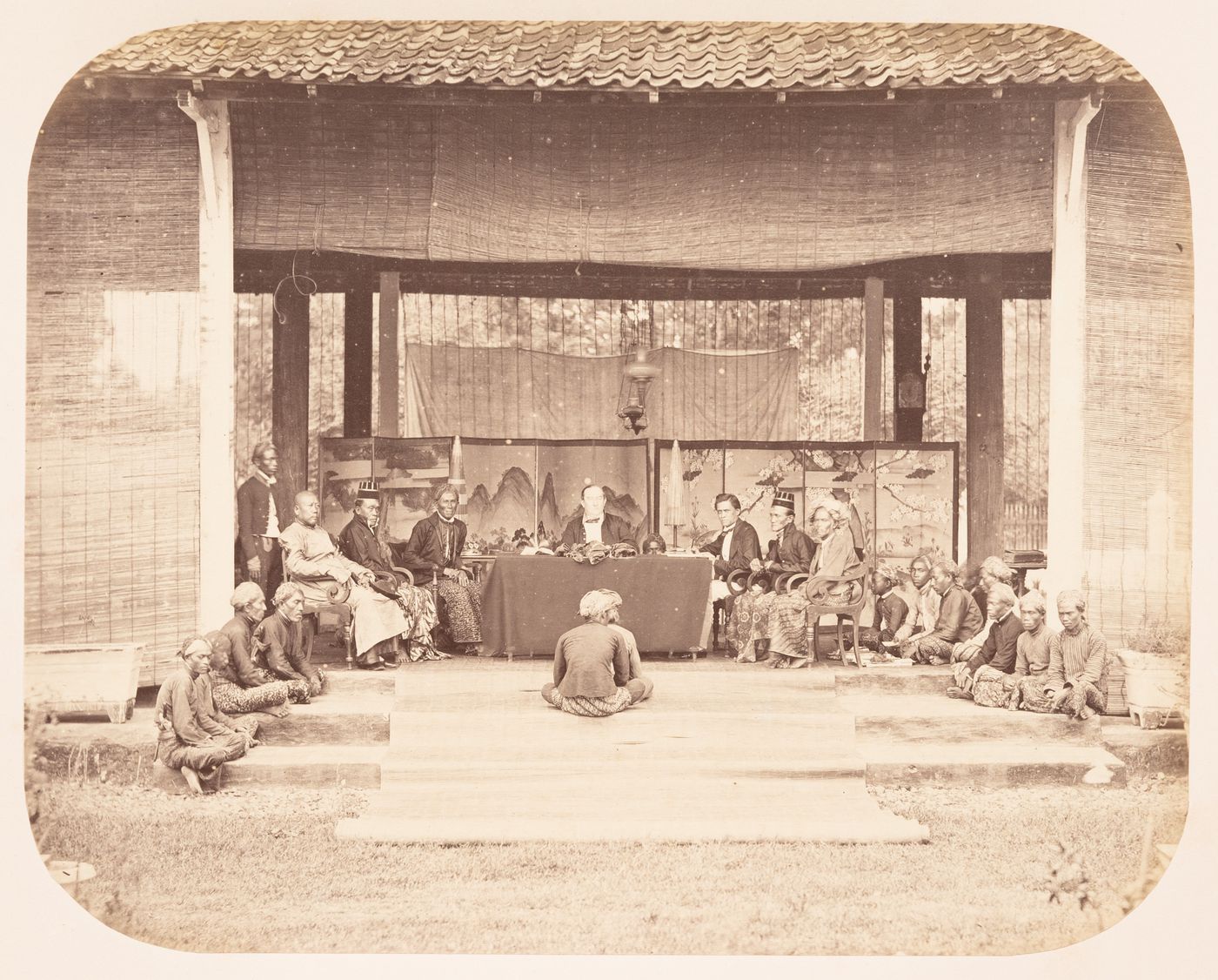 Group portrait of people at a judicial court, probably in Solo (now also known as Surakarta), Dutch East Indies (now Indonesia)