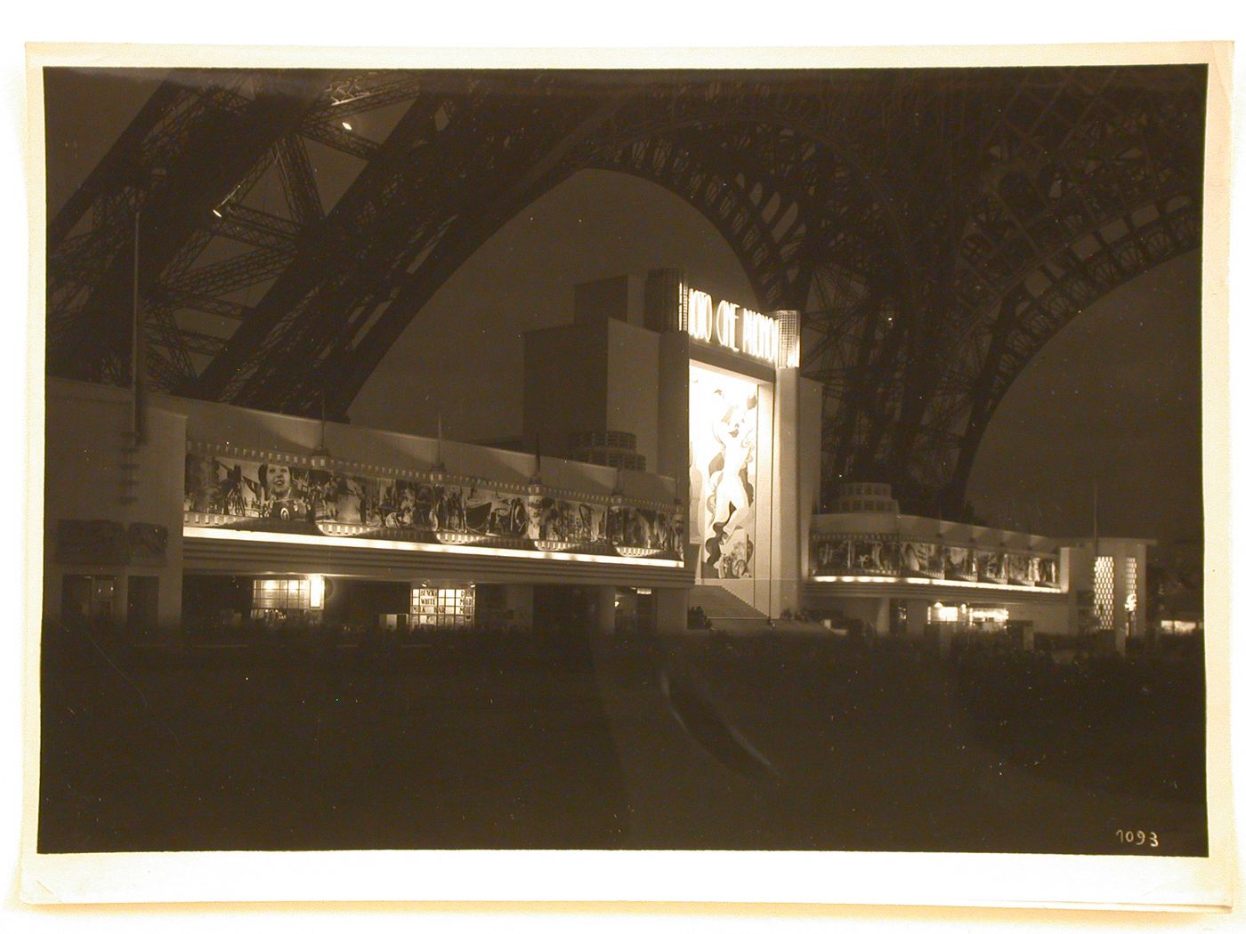 Night view of the Pavillon de Photo, Cine, Phono with the Tour Eiffel in the background, 1937 Exposition internationale, Paris, France