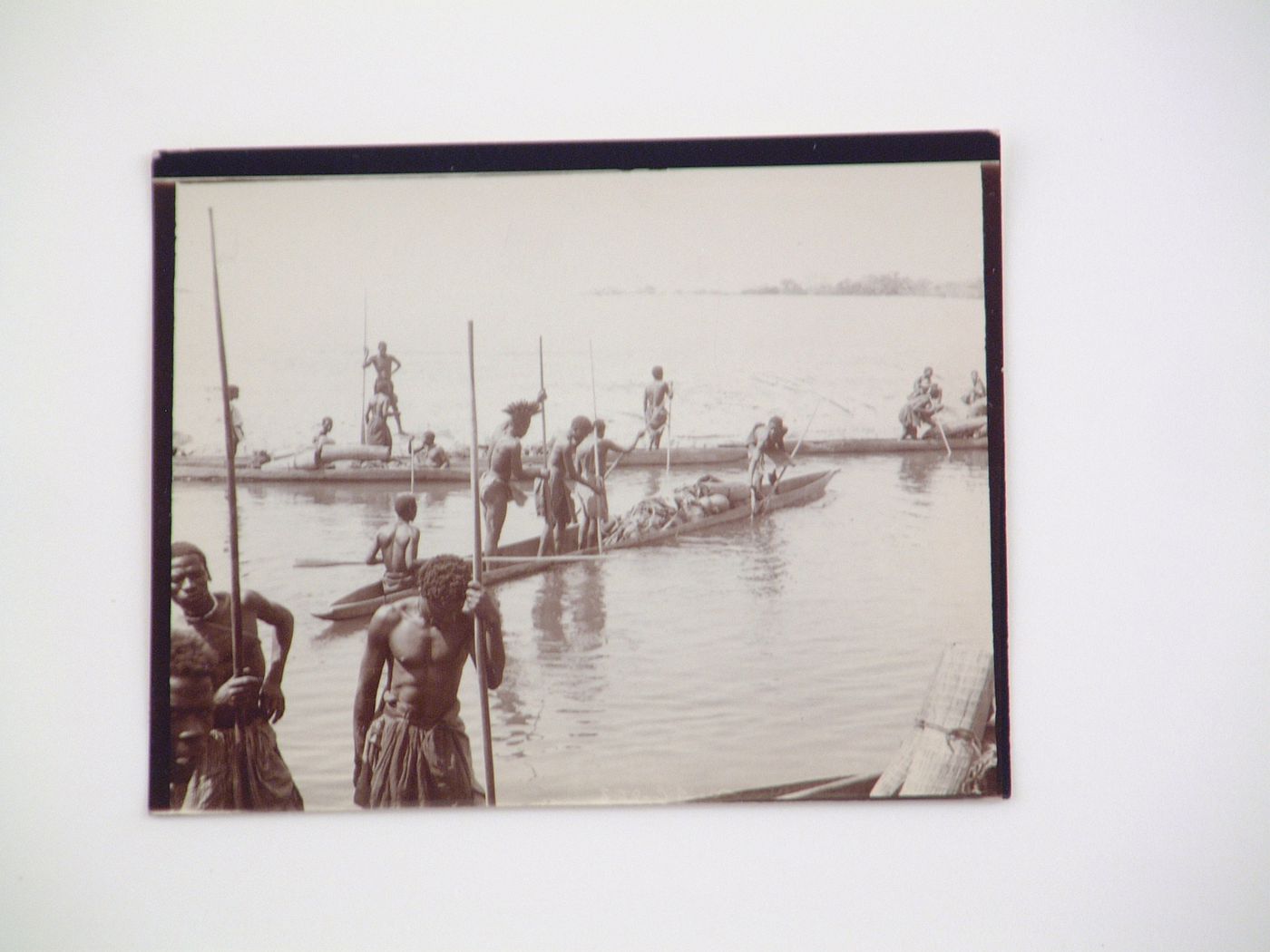 View of a group of people in mokoro (wooden dugout canoe) boats, Zambezi River