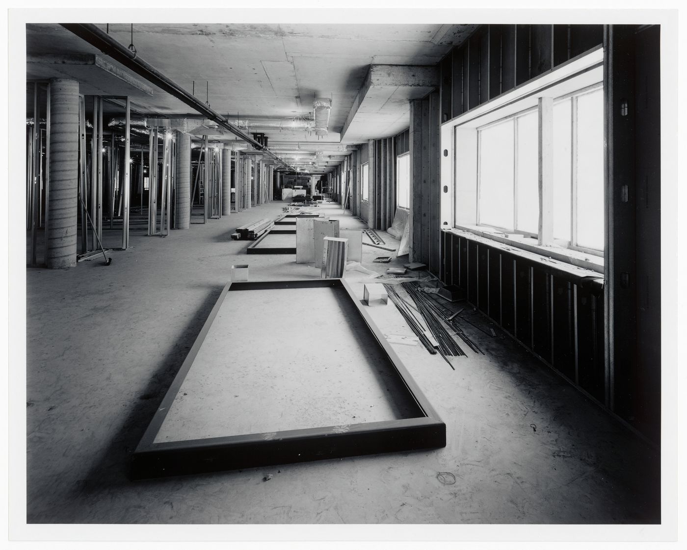 Interior view of the curatorial level [?] showing window frames prior to installation, Canadian Centre for Architecture under construction, Montréal, Québec