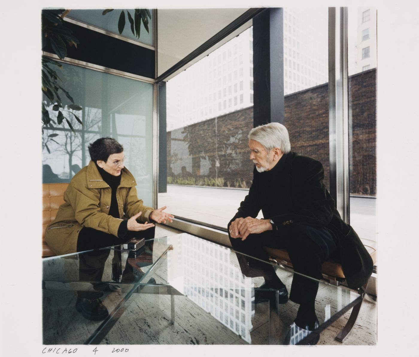 Interior view of the lobby of 880 Lake Shore Drive Apartments showing Phyllis Lambert and the architect George Danforth, Chicago, Illinois