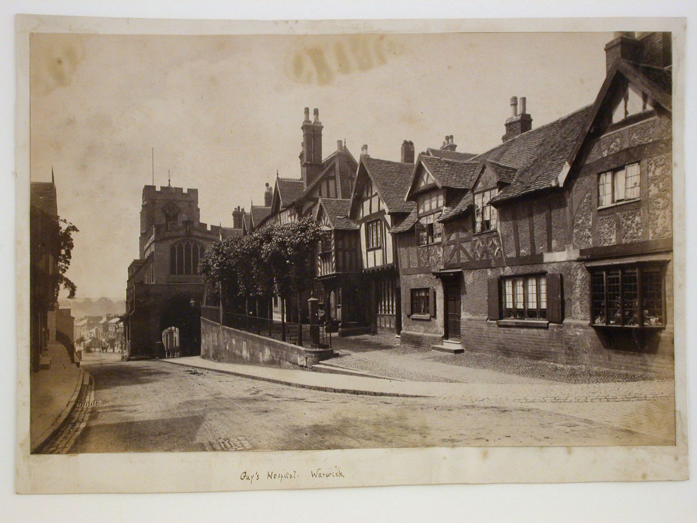 Guy's Hospital, view from town street amidst town houses, Warwick, England