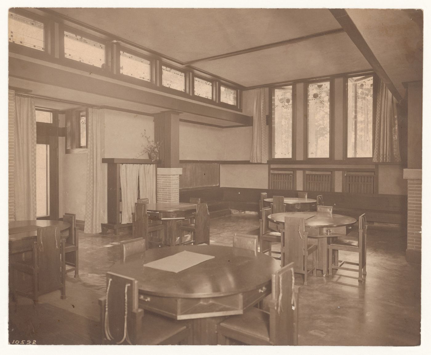 Interior view of Coonley Playhouse showing tables and side chairs, Riverside, Illinois