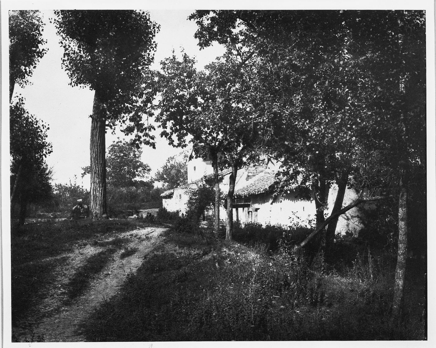 Cottage with thatched roof, France ?