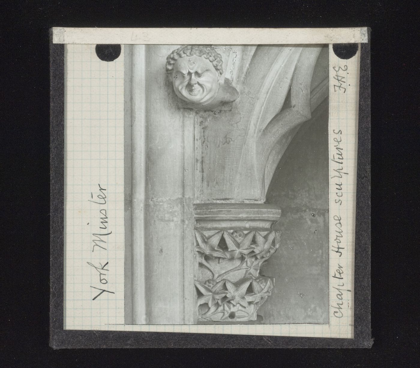 View of capital and sculpture of grotesque head in Chapter House of York Minster, York, North Yorkshire, England