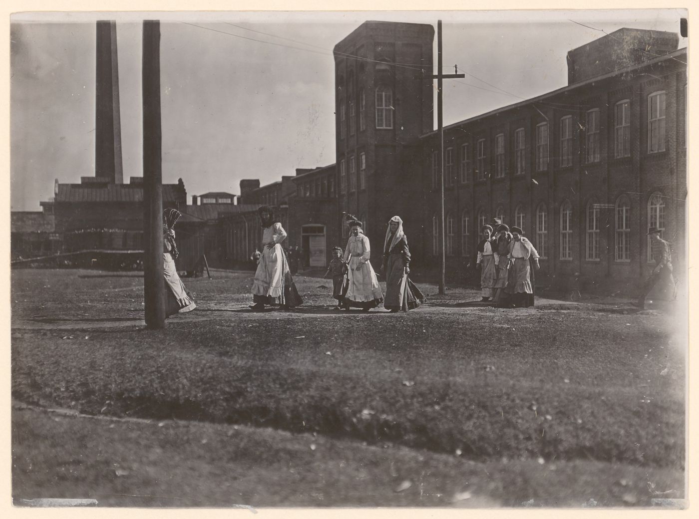 View of workers leaving Manchester Cotton Mill at noon, Macon, Georgia, United States