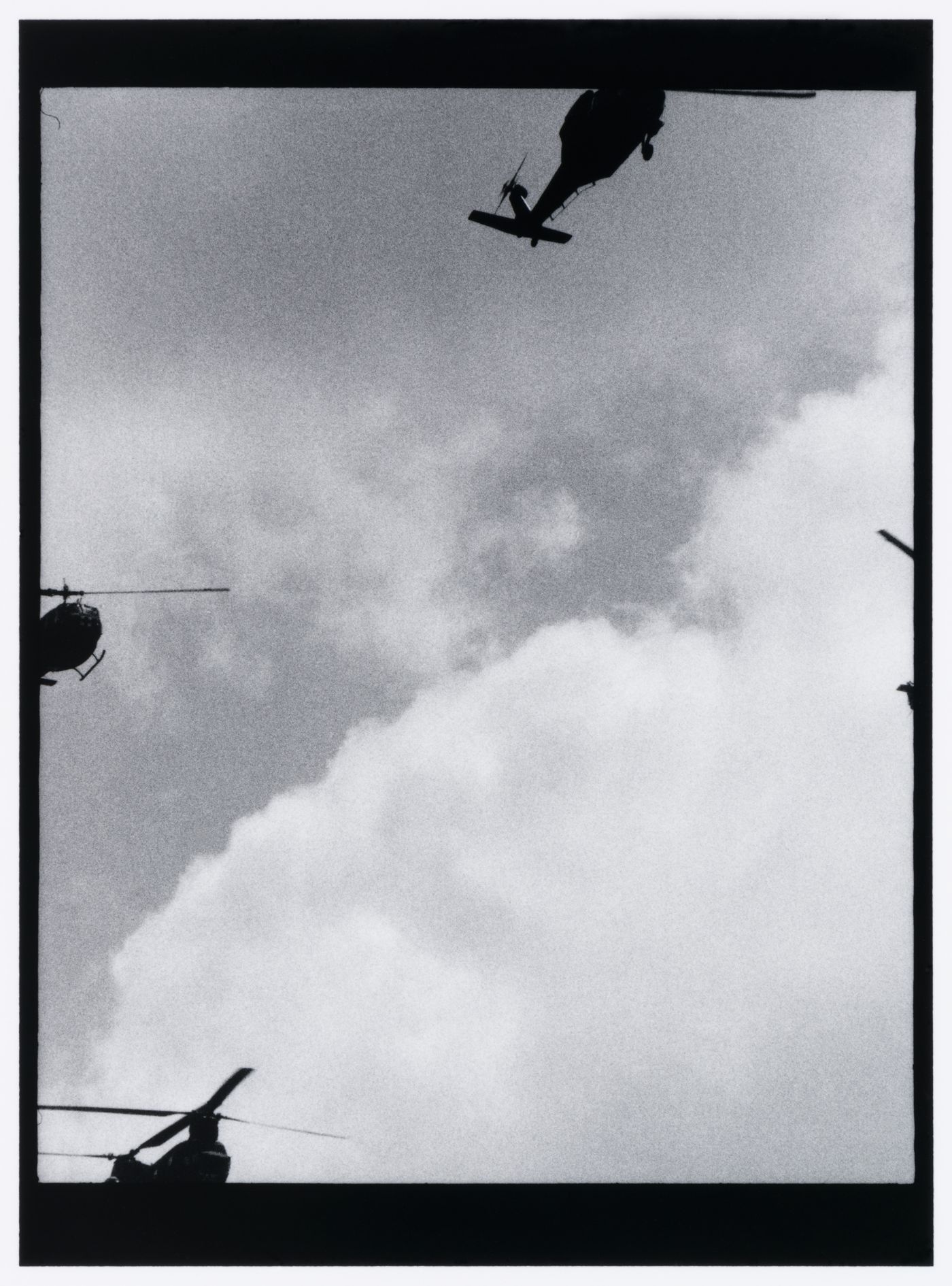 Partial view of four helicopters in flight and clouds, Washington D.C., United States, from the series "Empire"