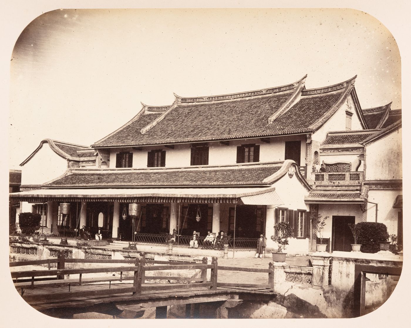 View of a mansion in Semarang showing a wooden bridge in the foreground, Dutch East Indies (now Indonesia)