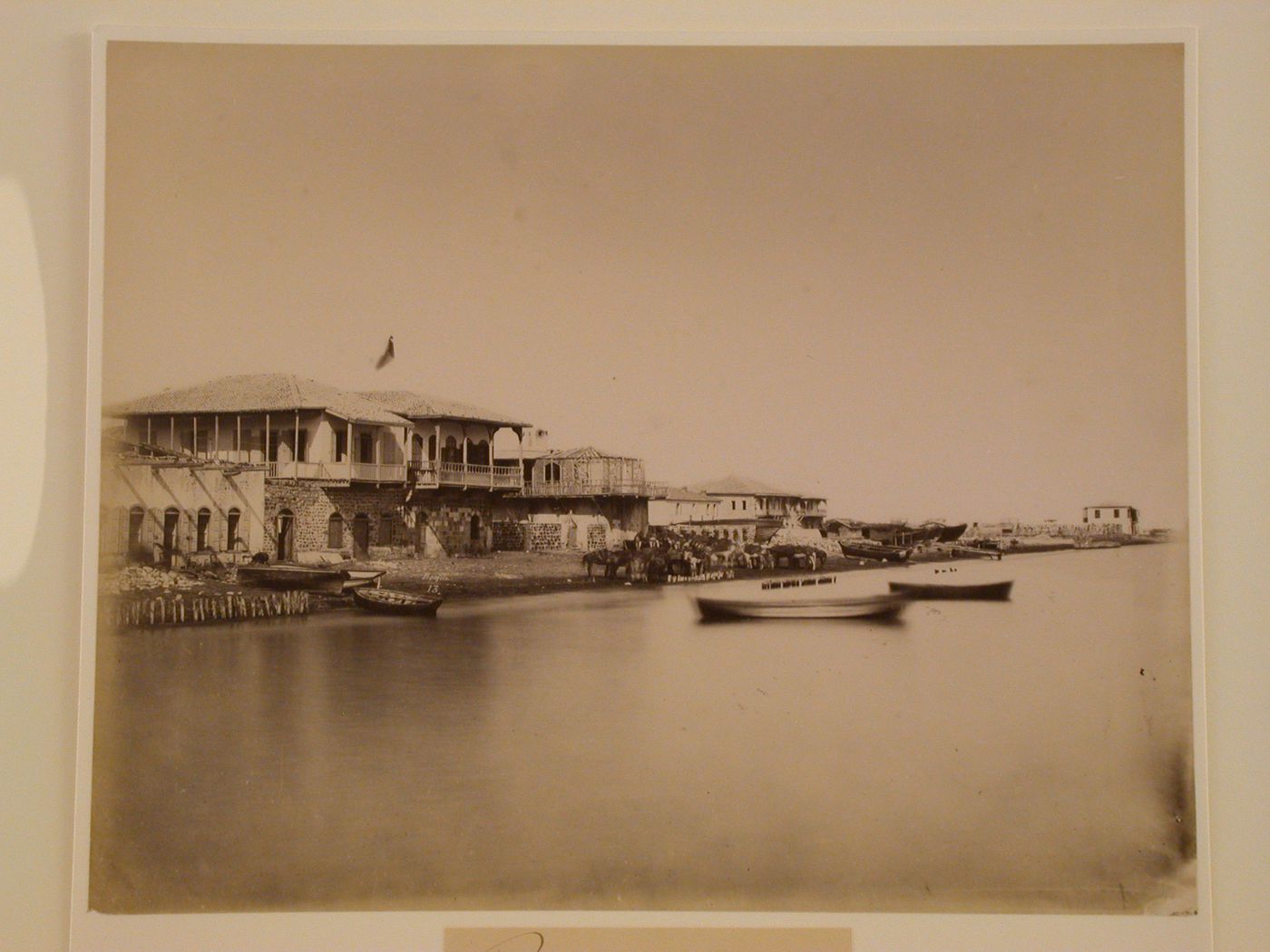 View of houses and boats on the shore, Alexandrette (now Iskendrun) or Mersina (now Icel), Ottoman Empire (now in Turkey)