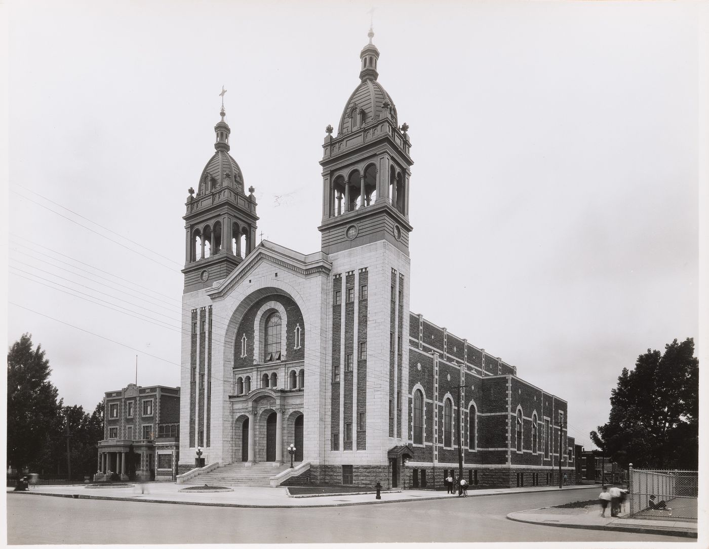 View of the principal and lateral façades of Église Saint-Vincent-Ferrier, 8115 avenue Henri-Julien, Montréal, Québec